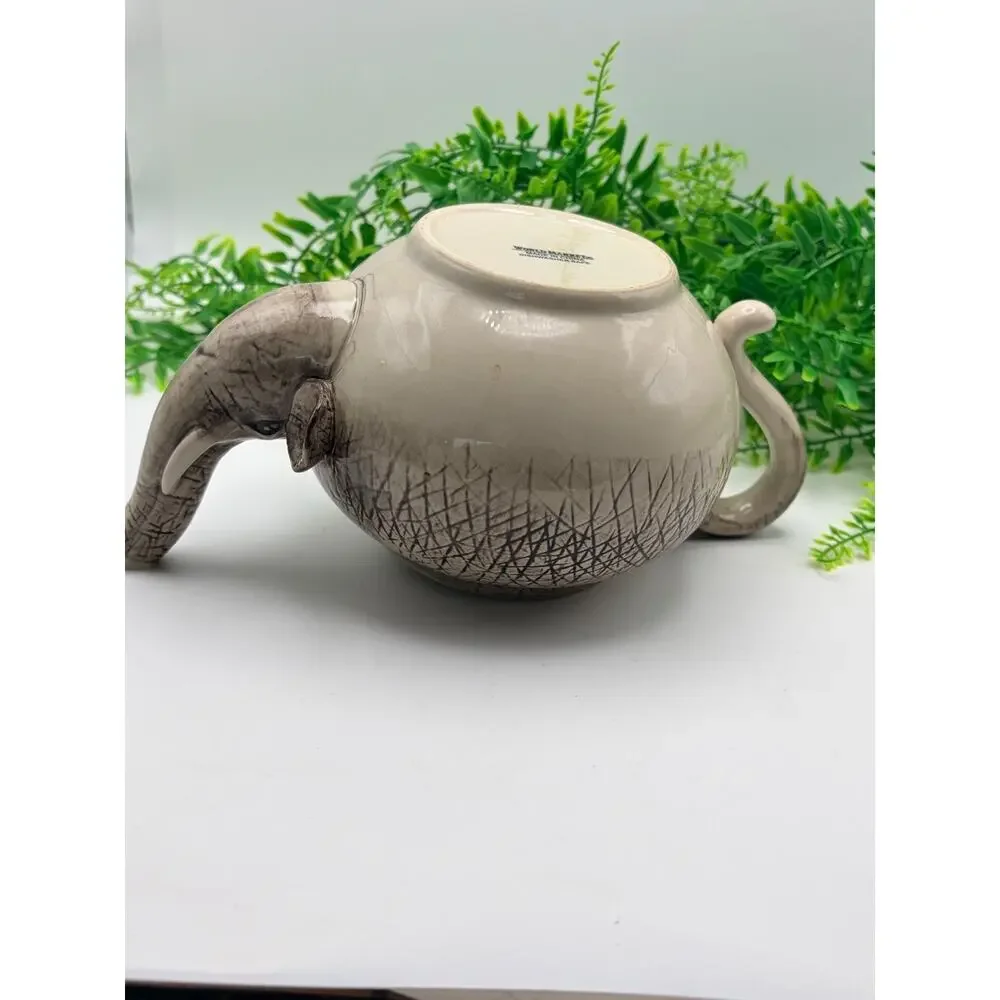 Vintage world market elephant tea pot.